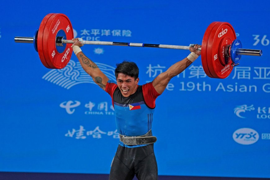 Pinoy weightlifter John Ceniza clinches Paris Olympics berth